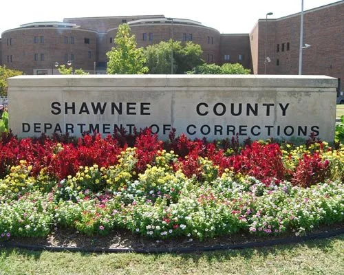 Shawnee County Department of Corrections sign.